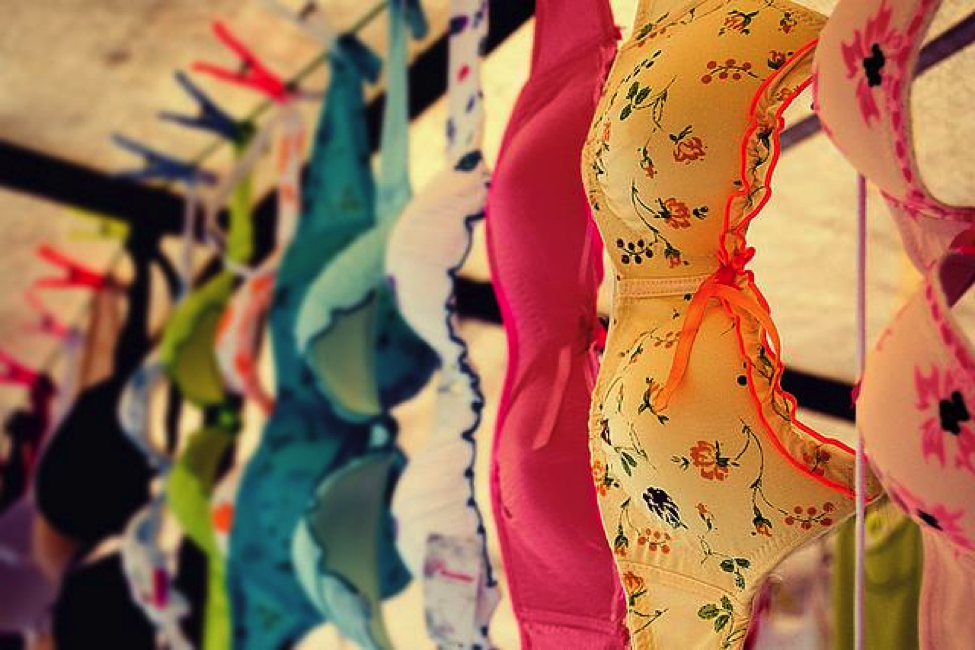 Close-up view of a rack of colorful bras.