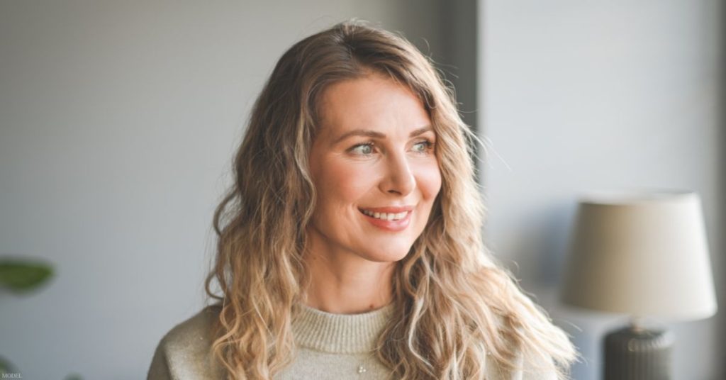 Smiling middle aged woman (model)